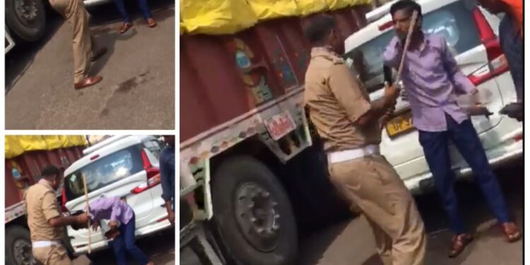 शर्म करो चुल्लूभर पानी में डूब मरोः 
निर्दोष टैक्सी चालक को पीटता ट्रैफ़िक विभाग का बहादुर सिपाही